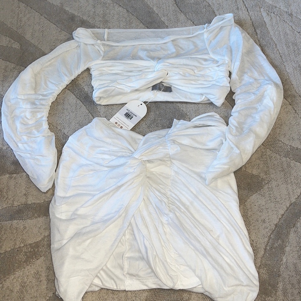 OutCast white skirt set.